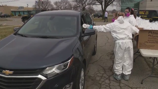 Brothers hand out toilet paper, hand sanitizer to Troy community