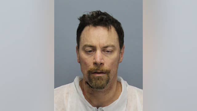 Hazel Park man strangled wife and kept her body lying in bed for days, police say