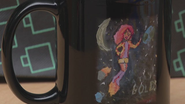 Royal Oak coffee shop selling mugs and cards with Beaumont patient drawings on them