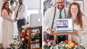 Refusing to let COVID-19 win, couple holds emotional wedding at home with family and friends on Zoom