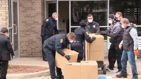Detroit Rescue Mission, Dearborn cops deliver food at senior living apartments
