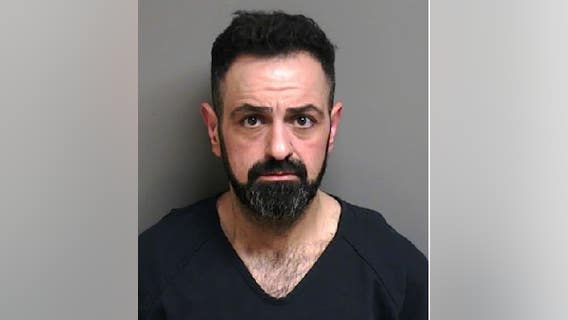 Shelby Twp man arrested with stolen guns in his car