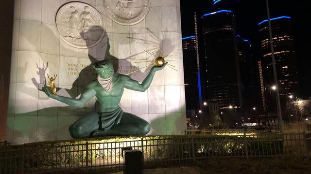 Spirit of Detroit seen with a mask as city and state leaders recommend wearing them in public