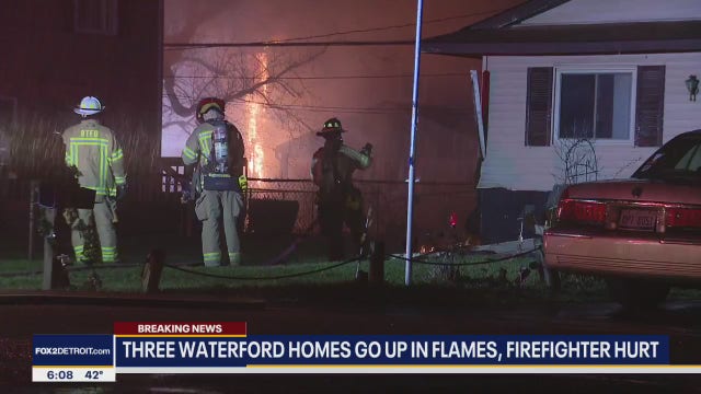 Waterford township homes catch fire after power line falls, one firefighter injured
