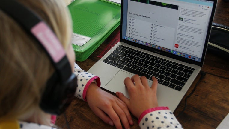 getty (file home school) Rural Parents Struggle With Internet Infrastructure As They Home School Children During Coronavirus Lockdown