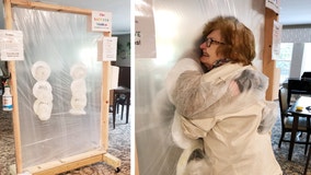 Senior community builds hug station to safely bring joy back to residents