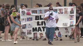 Protesters gather after white deputy seen punching black woman repeatedly on video