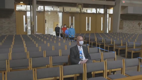 Blocked-off pews and carefully-placed communion, Catholic Mass returns to Detroit Tuesday