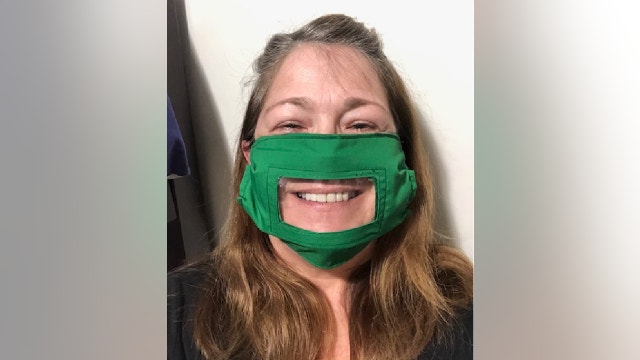 Audiologist makes clear mask so hearing loss patients can still read her lips and see her smiles