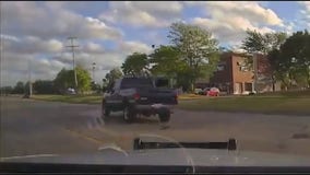 Police dashcam shows harrowing pursuit of suspect with wife, 1-year-old inside truck