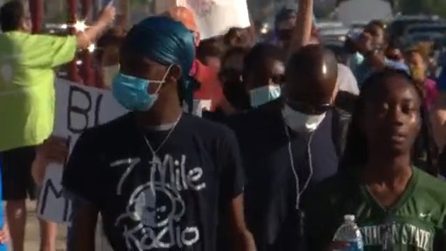 About 100 protest against police brutality down Van Dyke in Warren