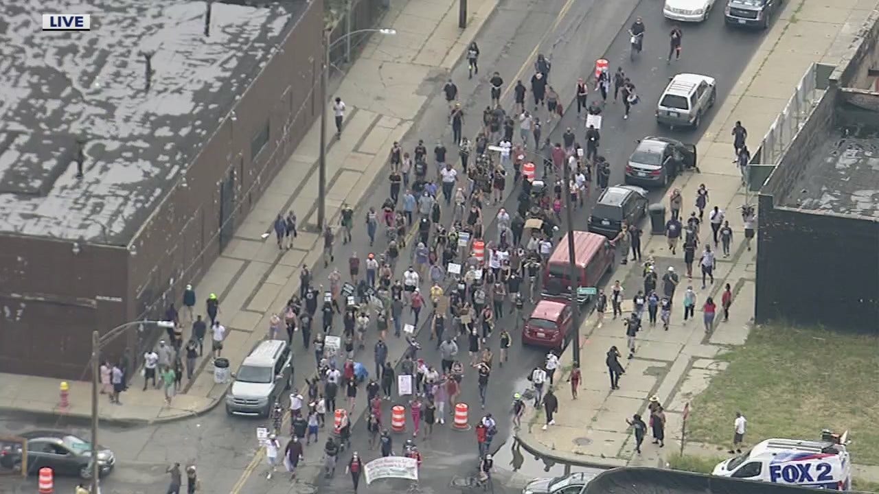 Large crowd of protesters gather at scene of fatal Detroit police shooting