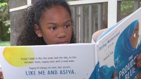 Farmington Hills girl reviews books that include children of color for online blog