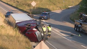 Coca-Cola semi-truck crash causes closure at I-96, I-94