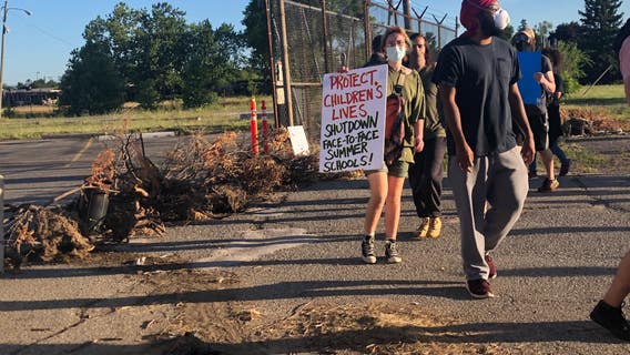 Protesters block buses on Detroit school's first day of summer classes