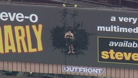 LAFD responds to unusual call for service after man tapes himself to billboard in publicity stunt