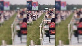 Attendees sit on own platforms at socially distanced outdoor concert held in UK amid pandemic