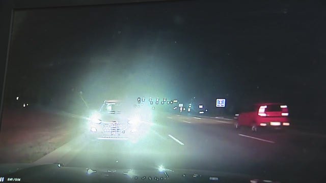 Utica police officer helps protect woman from wrong way driver on Hall Road