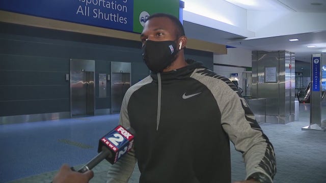 After being held in Guam from Covid test mistake, Detroit Marine vet comes home