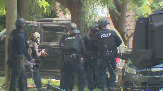 Police searching for two men after shooting, barricaded gunman situation on Detroit's east side