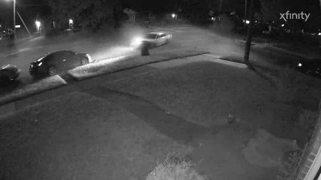 Surveillance video shows suspected drunk driver crash into Detroit family's cars