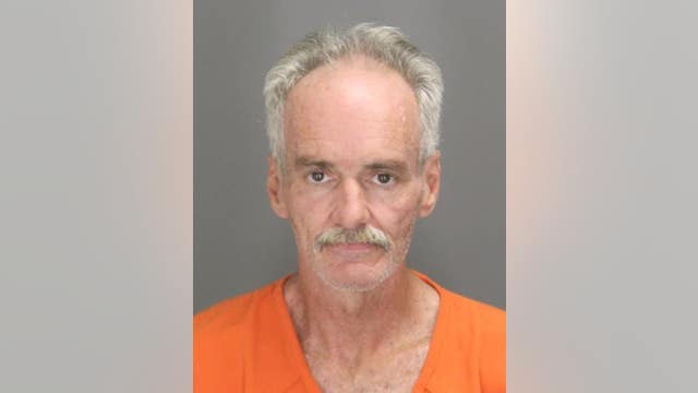 Suspect charged with murder of poker player found burned in Oakland County