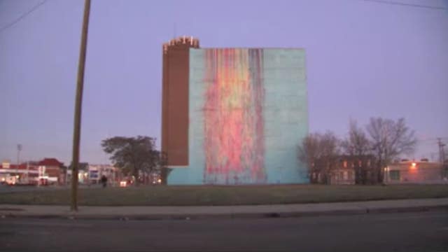 "The Girl with the D Earring" mural being painted in downtown Detroit