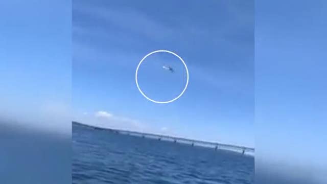 Somebody flew a plane under the Mackinac Bridge. The Coast Guard is asking for help identifying it