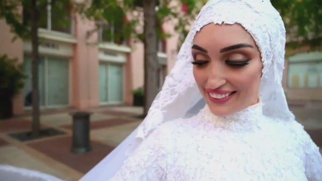 Troy doctor who survived Beirut blast in wedding dress returns home, awaits husband