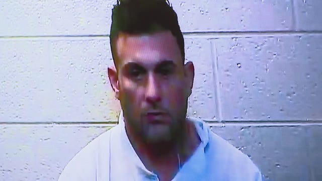 Execution-style murder suspect Googled expensive watches & news about burning vehicles in Detroit, police say