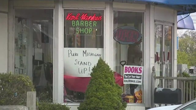 Owosso barber who defied Whitmer has charges dropped but may still lose license to work