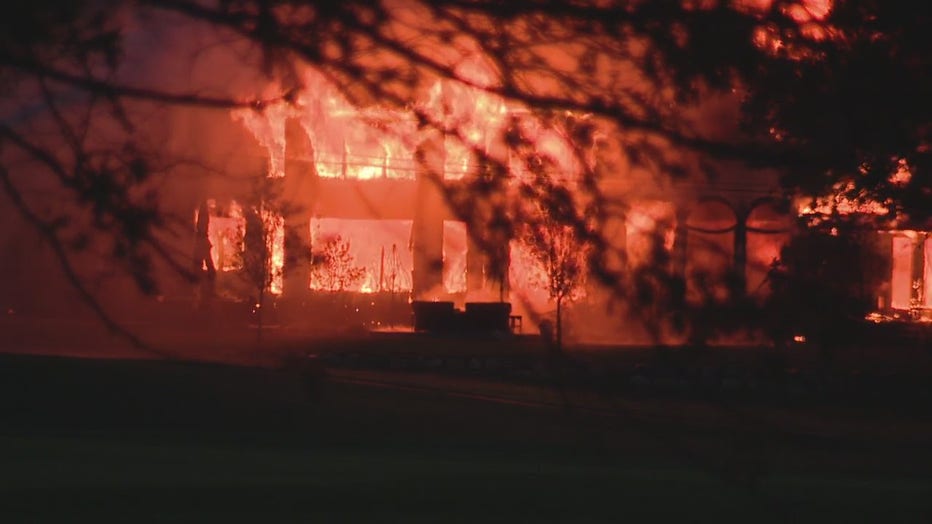 This house fire reduced a mansion to a total loss Friday.