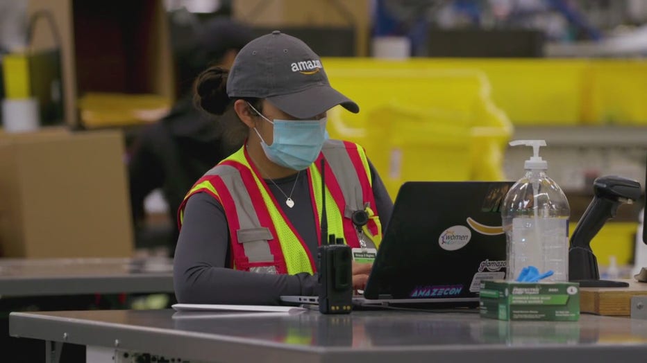 Amazon worker at a distribution center.