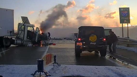 Michigan State Police trooper saves man from burning wreck on I-275