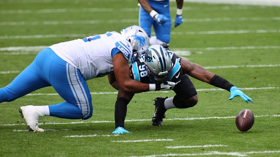 P.J. Walker wins first NFL start as Panthers blank Lions