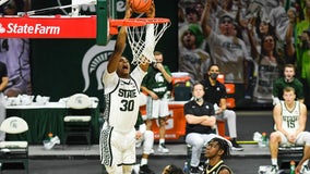 Hauser nets 24, No. 8 Michigan St. tops Western Mich. 79-61