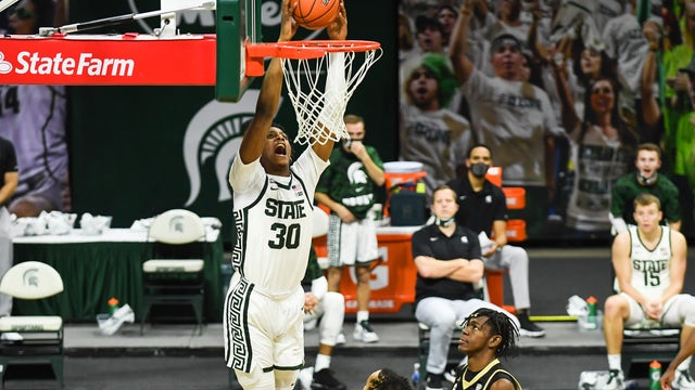 Hauser nets 24, No. 8 Michigan St. tops Western Mich. 79-61