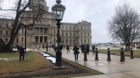 Small group of protesters act peacefully at state Capitol among heavy police presence