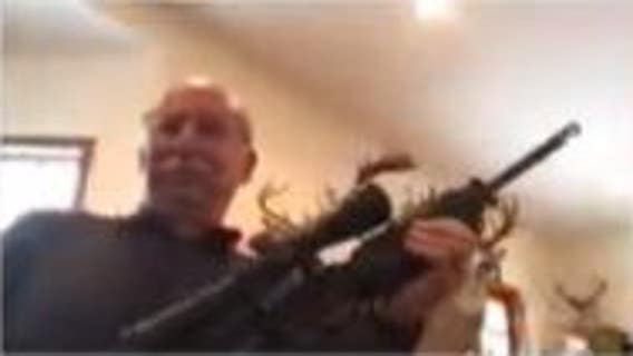 Michigan county official shows gun after criticism of public meeting featuring Proud Boys