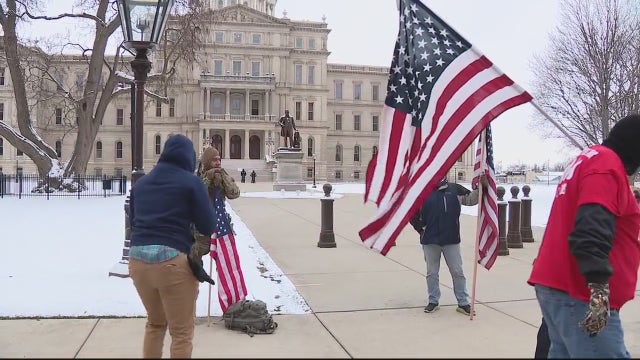 Sparse crowd of protesters in Lansing on inauguration day