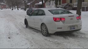 Some snowy Detroit streets remain unplowed from Monday's snowstorm