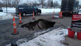 Massive sinkhole opens up in west Detroit after water main break