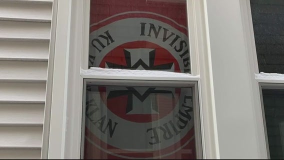 "Hate has no home here" rally held after KKK flag hung in window
