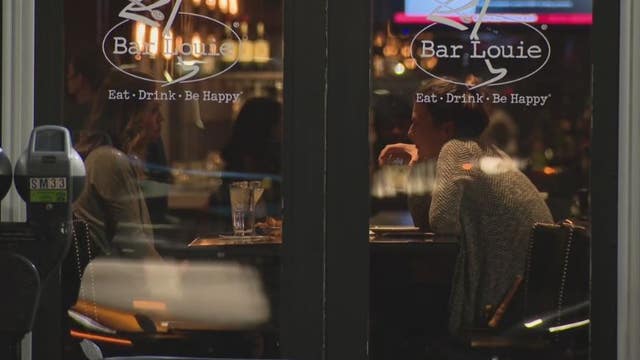 Customers return for indoor dining with pandemic restrictions still ongoing