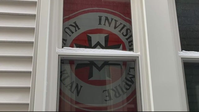 "Hate has no home here" rally held after KKK flag hung in window