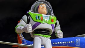 Southwest employees send lost Buzz Lightyear toy on epic adventure before returning him to family