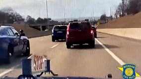 WATCH: Police stop wanted kidnapping suspect from fleeing on Lodge Freeway in Detroit