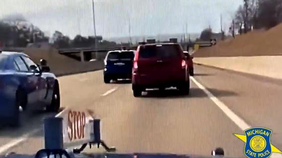 WATCH: Police stop wanted kidnapping suspect from fleeing on Lodge Freeway in Detroit