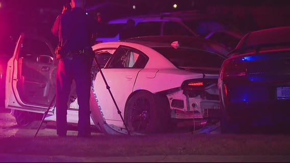 Two arrested after pointing guns at Detroit police and crashing into police cruiser