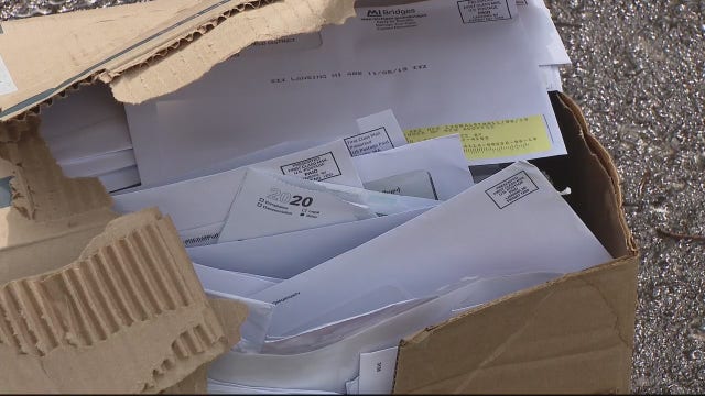 Piles of personal employee files found in dumpster behind shuttered Commerce Township business after eviction
